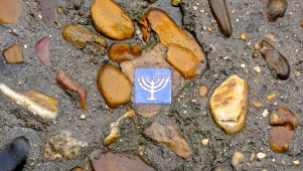 There were lots of tiles with Hebrew letters and menorahs scattered around.